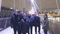 Mike and Gail Perlman, Diana Stein, Leslie Nyman, Angela Combest, and Erin Patrick on the Golden Jubilee Bridge